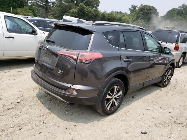 Photo 3 from auction – 2017 TOYOTA RAV4 XLE with VIN 2T3RFREV9HW683130