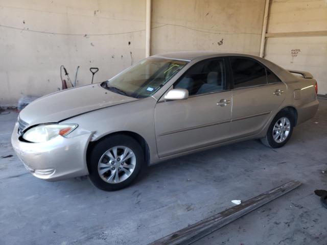 TOYOTA CAMRY LE 2004 with VIN 4T1BF32K34U574951 - Photo from auction