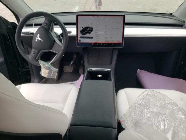 Photo 8 from auction – 2022 TESLA MODEL Y with VIN 7SAYGDEE6NF315214