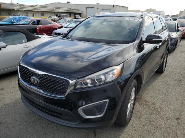 KIA SORENTO LX 2016 with VIN 5XYPG4A55GG010443 - Photo from auction