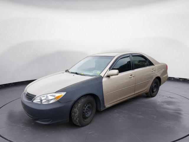 TOYOTA CAMRY LE 2002 with VIN 4T1BE32K12U110184 - Photo from auction