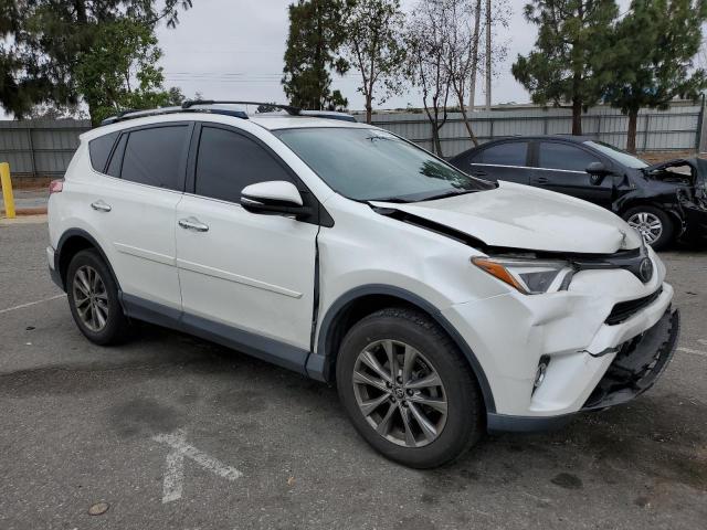 Photo 4 from auction – 2017 TOYOTA RAV4 LIMIT with VIN JTMYFREV6HJ717468