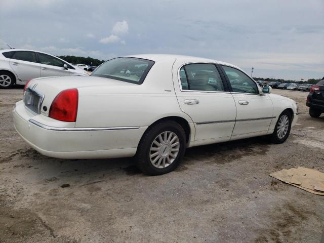 Photo 3 from auction – 2004 LINCOLN TOWN CAR U with VIN 1LNHM83W84Y604369
