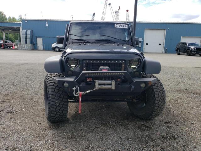 Photo 5 from auction – 2015 JEEP WRANGLER U with VIN 1C4BJWFG8FL522637