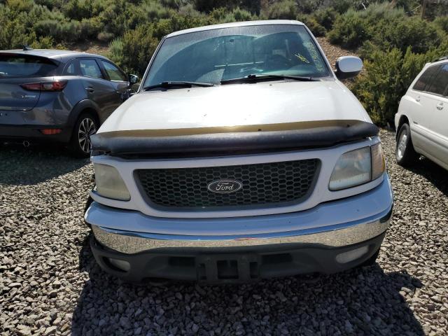 Photo 5 from auction – 2000 FORD F150 with VIN 1FTRX18L9YKA52038