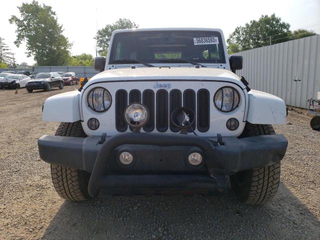 Photo 5 from auction – 2015 JEEP WRANGLER U with VIN 1C4BJWEG3FL684824