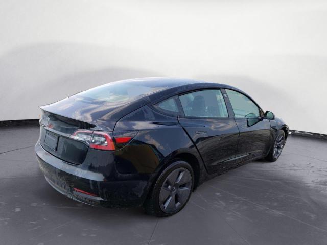 Photo 3 from auction – 2021 TESLA MODEL 3 with VIN 5YJ3E1EA6MF087500