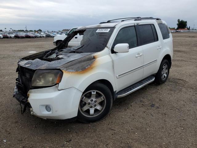 HONDA PILOT TOUR 2011 with VIN 5FNYF4H90BB067908 - Photo from auction