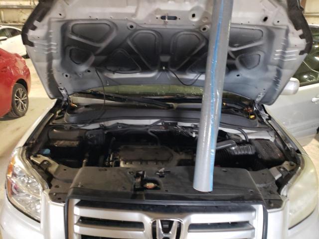 Photo 11 from auction – 2006 HONDA PILOT EX with VIN 5FNYF28566B015142