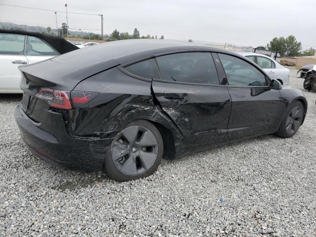 Photo 3 from auction – 2021 TESLA MODEL 3 with VIN 5YJ3E1EA7MF982011