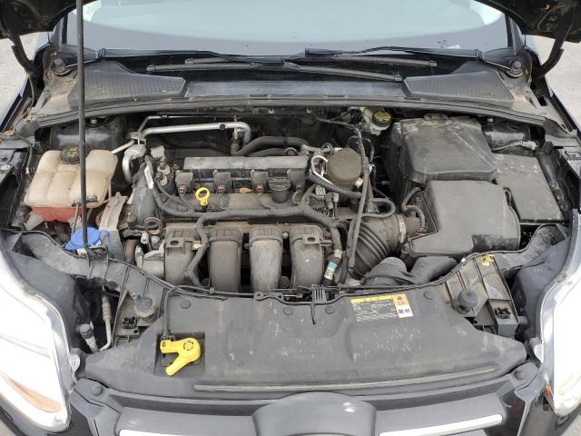 Photo 11 from auction – 2014 FORD FOCUS SE with VIN 1FADP3F29EL207182