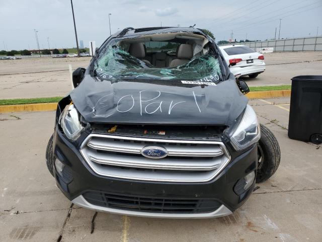 Photo 5 from auction – 2017 FORD ESCAPE SE with VIN 1FMCU9GD6HUD11690