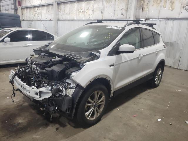 FORD ESCAPE SE 2018 with VIN 1FMCU9GD9JUD37853 - Photo from auction