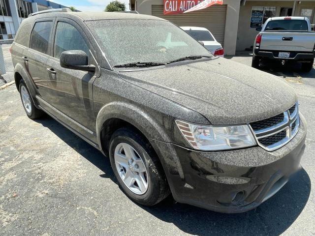 Photo 1 from auction – 2014 DODGE JOURNEY SX with VIN 3C4PDCBG4ET285391