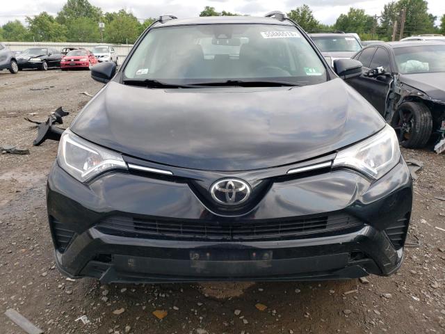 Photo 5 from auction – 2018 TOYOTA RAV4 LE with VIN 2T3BFREV0JW725630