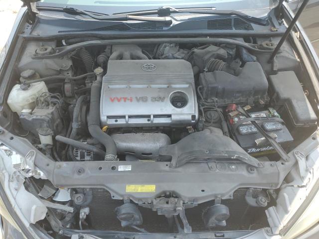 Photo 11 from auction – 2005 TOYOTA CAMRY LE with VIN 4T1BF30K15U597052
