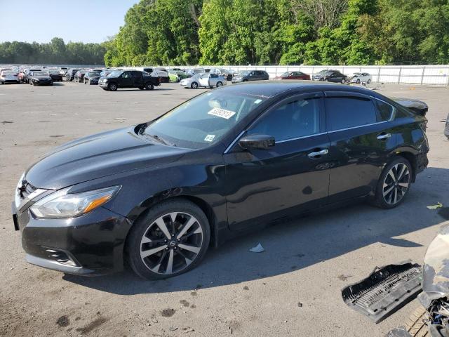 NISSAN ALTIMA 2.5 2018 with VIN 1N4AL3AP2JC105427 - Photo from auction