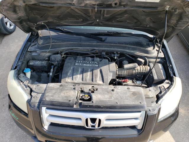 Photo 11 from auction – 2006 HONDA PILOT EX with VIN 2HKYF18496H505559