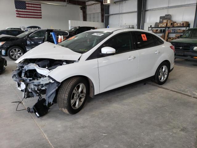 FORD FOCUS SE 2014 with VIN 1FADP3F21EL209749 - Photo from auction