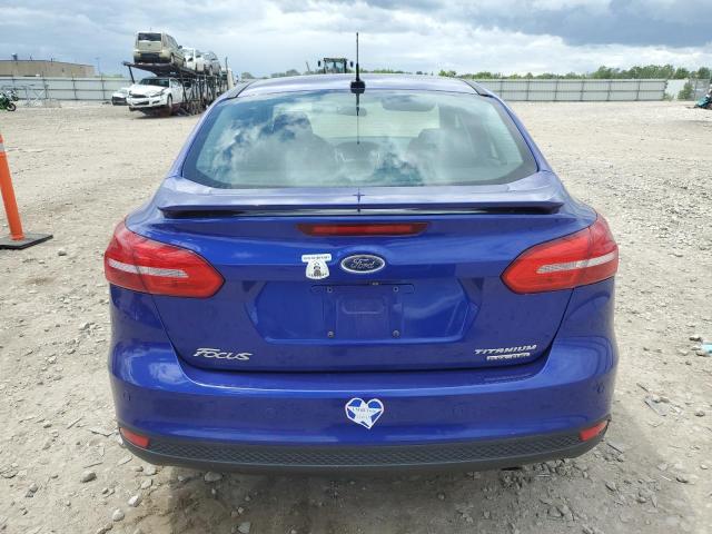 Photo 6 from auction – 2015 FORD FOCUS TITA with VIN 1FADP3J22FL382897