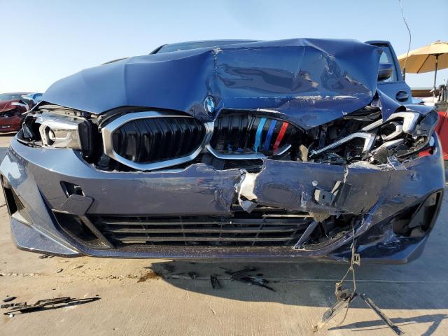 Photo 5 from auction – 2023 BMW 330I with VIN 3MW69FF07P8D11657