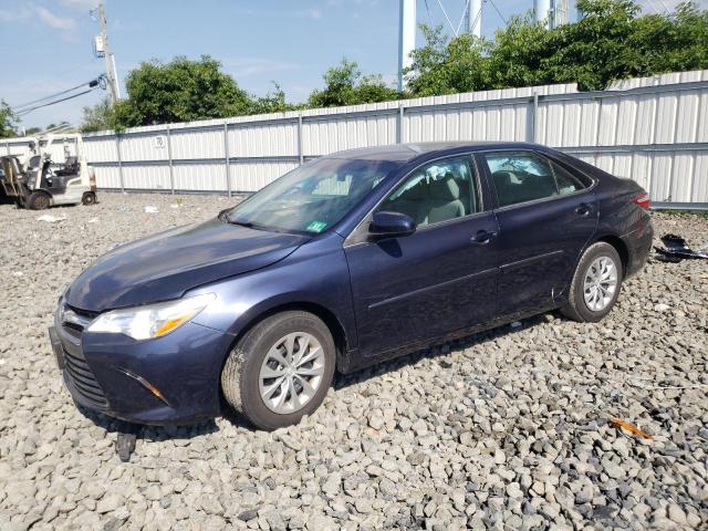 TOYOTA CAMRY LE 2017 with VIN 4T1BF1FK8HU651639 - Photo from auction