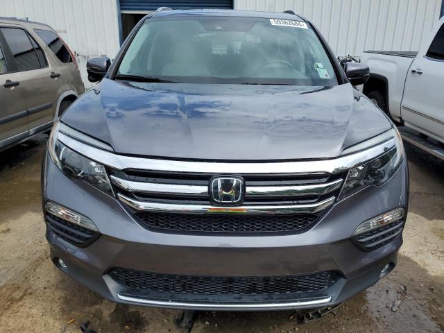 Photo 5 from auction – 2017 HONDA PILOT TOUR with VIN 5FNYF5H96HB001555