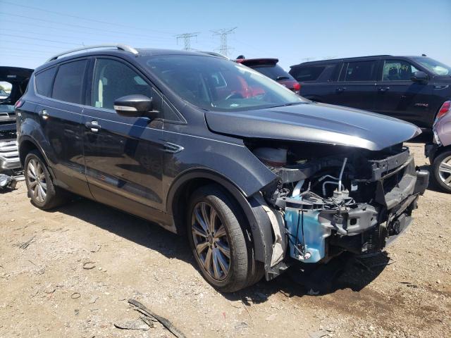 Photo 4 from auction – 2018 FORD ESCAPE TIT with VIN 1FMCU9J94JUD34640