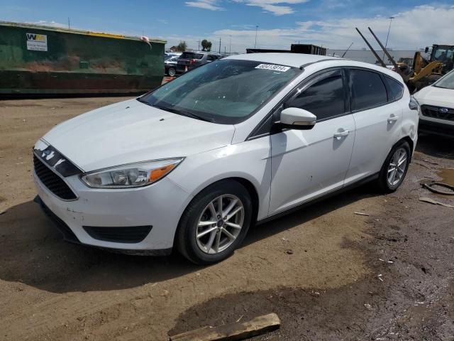 FORD FOCUS SE 2017 with VIN 1FADP3K27HL270954 - Photo from auction