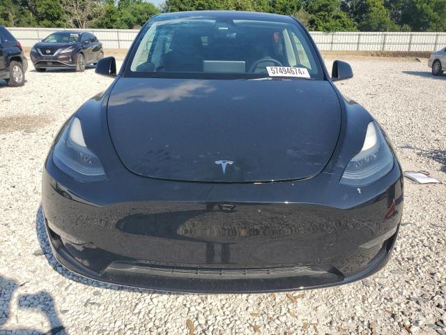 Photo 5 from auction – 2023 TESLA MODEL Y with VIN 7SAYGAEE9PF695067