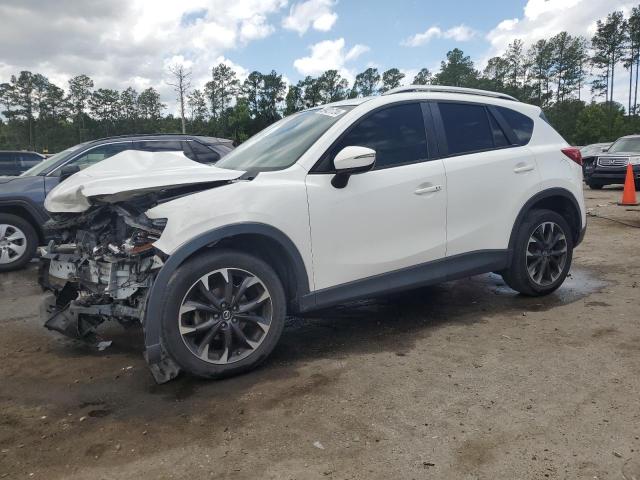 MAZDA CX-5 GT 2016 with VIN JM3KE4DY2G0858136 - Photo from auction
