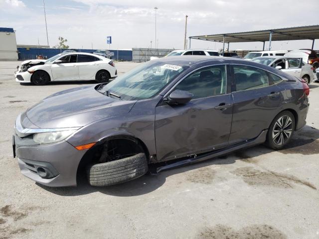 HONDA CIVIC EX 2016 with VIN 19XFC1F39GE027059 - Photo from auction