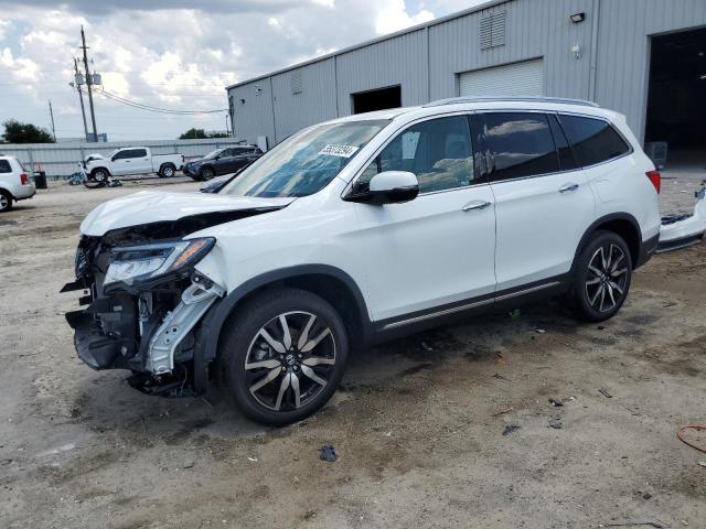 HONDA PILOT ELIT 2022 with VIN 5FNYF6H03NB010409 - Photo from auction