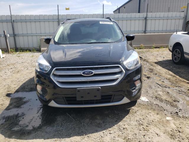 Photo 5 from auction – 2018 FORD ESCAPE SE with VIN 1FMCU9GD9JUC84829