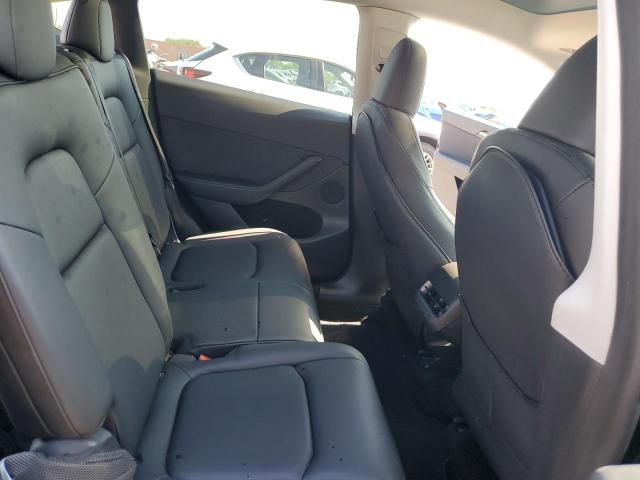 Photo 10 from auction – 2023 TESLA MODEL Y with VIN 7SAYGAEE6PF761476