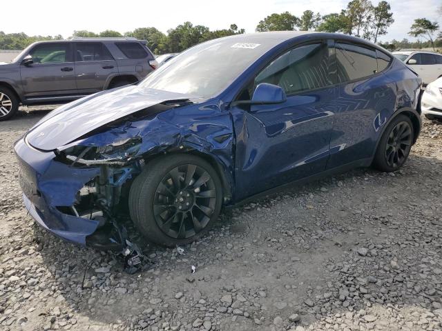 TESLA MODEL Y 2023 with VIN 7SAYGDEE1PA140399 - Photo from auction