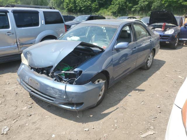 TOYOTA CAMRY LE 2003 with VIN 4T1BE30KX3U718600 - Photo from auction
