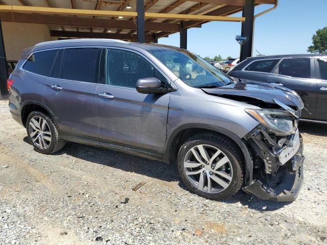 Photo 4 from auction – 2016 HONDA PILOT ELIT with VIN 5FNYF6H06GB103489