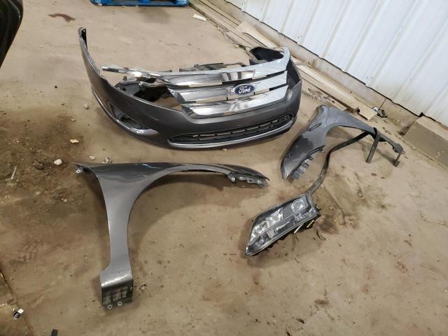 Photo 12 from auction – 2011 FORD FUSION HYB with VIN 3FADP0L36BR223705