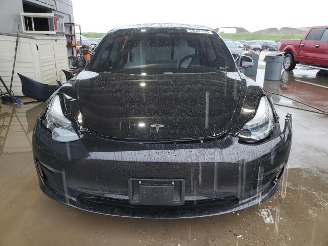 Photo 5 from auction – 2021 TESLA MODEL 3 with VIN 5YJ3E1EB9MF856161