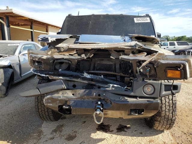 Photo 5 from auction – 2003 HUMMER H2 with VIN 5GRGN23U13H104057