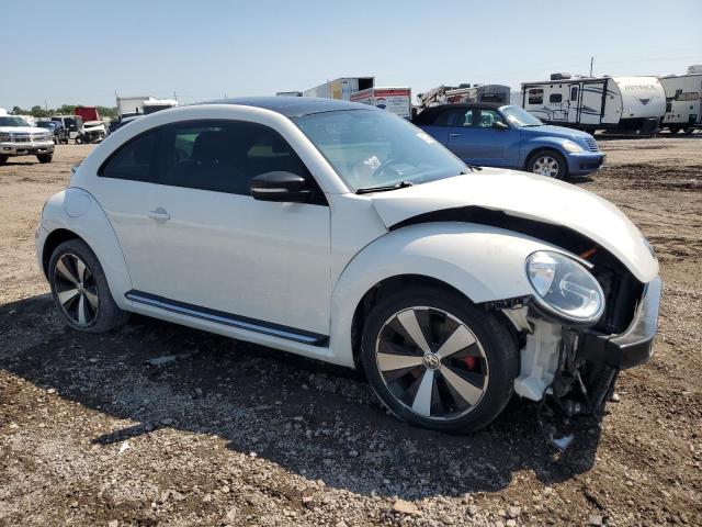 Photo 4 from auction – 2013 VOLKSWAGEN BEETLE TUR with VIN 3VWVA7AT2DM632017