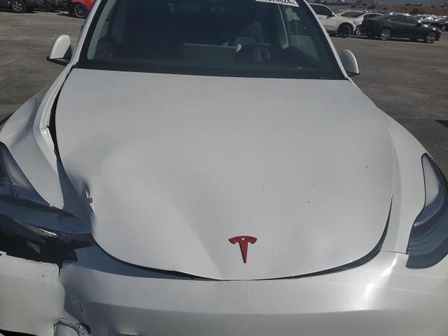 Photo 11 from auction – 2023 TESLA MODEL Y with VIN 7SAYGDEE8PA035410