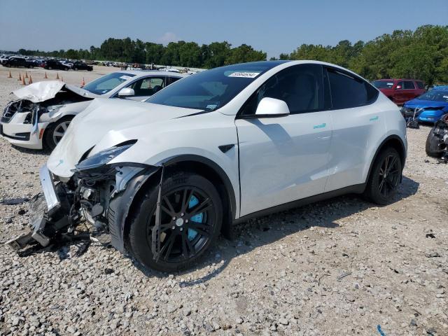 TESLA MODEL Y 2022 with VIN 7SAYGAEE7NF322381 - Photo from auction