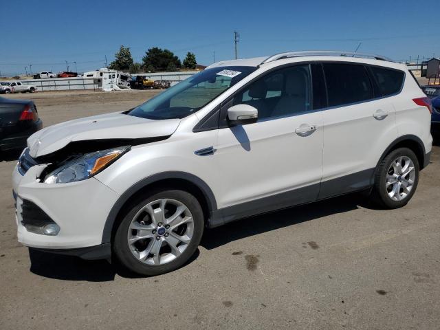 FORD ESCAPE TIT 2016 with VIN 1FMCU0JX7GUB73297 - Photo from auction