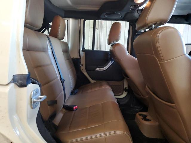 Photo 10 from auction – 2011 JEEP WRANGLER U with VIN 1J4BA5H12BL592299