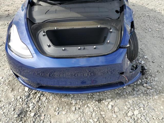 Photo 11 from auction – 2023 TESLA MODEL Y with VIN 7SAYGDEE1PA140399