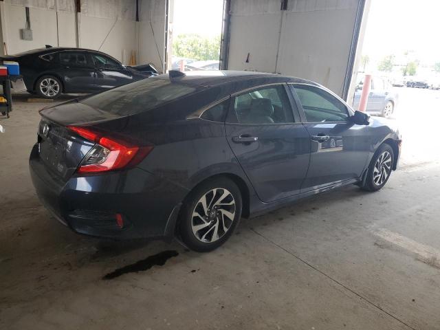 Photo 3 from auction – 2018 HONDA CIVIC EX with VIN 19XFC2F79JE007457