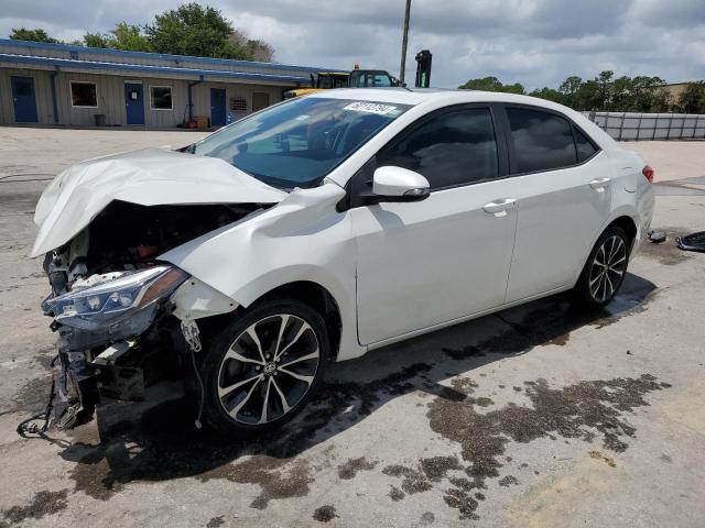 TOYOTA COROLLA L 2019 with VIN 5YFBURHE3KP871632 - Photo from auction