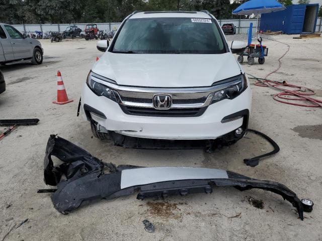 Photo 5 from auction – 2022 HONDA PILOT EXL with VIN 5FNYF5H50NB012298